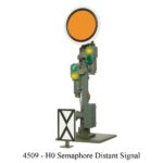 A traffic signal displaying a green light and an orange light