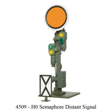 A traffic signal displaying a green light and an orange light