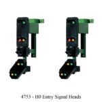 Train Model & Railway Accessories. Two traffic signal heads displaying the text "4753 HO signal heads" on a clear day