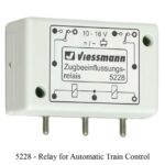 A Viessmann relay module for automatic train control with three terminals and a diagram on its label. Train Model & Railway Accessories available @ The Trainyard in Paarl